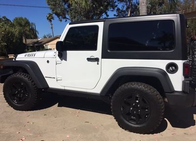 2-door Jeep with tints on all 5 windows