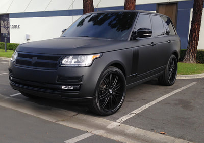 Range rover wrapped in all black 