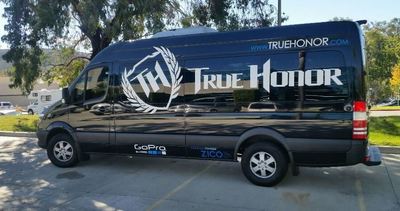 True Honor van wrapped with company logo