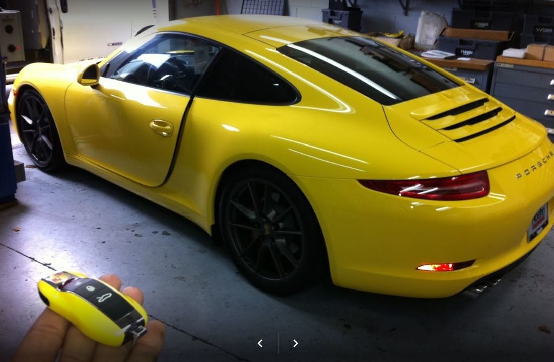 Yellow Porsche with key